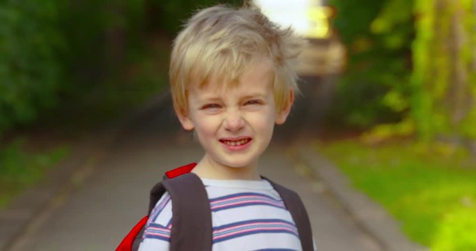 Portrait of a cute little boy smiling before he walks to school