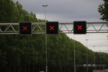 Red crosses above closed driving lanes on Highway A20 at Nieuwerkerk aan den IJssel, closed for...
