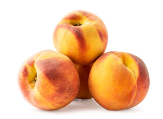 Pile of ripe peaches on a white background. Isolated.