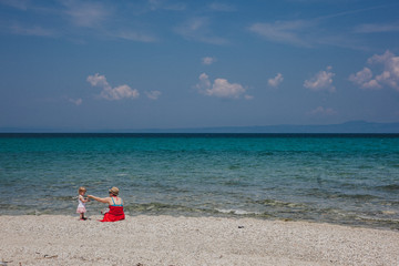 Mother and Daughter Playing at a Beach