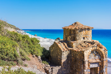 Fototapeta na wymiar Agios Pavlos beach with Saint Paul church, a very old Byzantine church that was built at the place Selouda, an incredible beach at Opiso Egiali area, Chania, Crete, Greece.