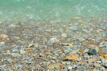 Fototapeta na wymiar Close up pebbles beach at crete, greece