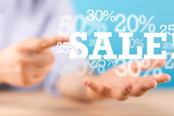 sale digital percent in hand