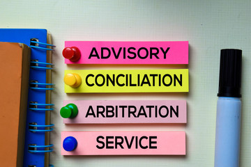 Advisory Conciliation and Arbitation Service - ACAS text on sticky notes isolated on office desk
