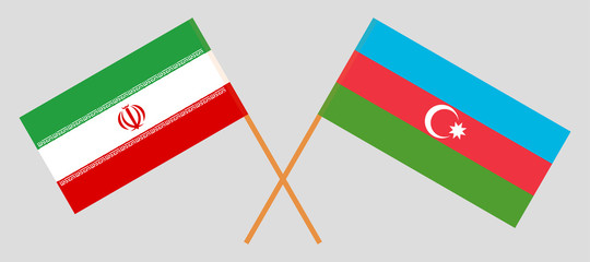 Azerbaijan and Iran. Crossed Azerbaijani and Iranian flags