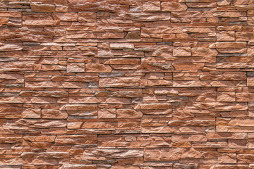 Brown brick wall or stone wall texture and background