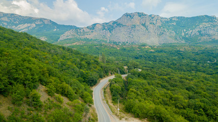 Fototapeta na wymiar Crimea trip: view from above of curvy mountain road