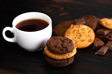 Chocolate cookies on wooden table.Homemade food on wooden background