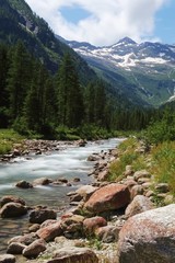The view of the Alps of the Quarazza valley, near the town of Macugnaga, Italy - July 2019.