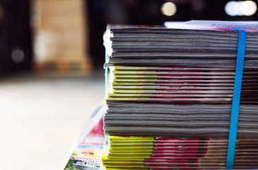 Bandaged pile of magazines in a warehouse