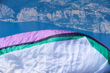 Detail of parachute (Fabric wing. Wing shape is maintained by the suspension lines) designed for paragliding with blue sky background