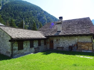 The architecture of the small town of Macugnaga and its hamlets, in the Italian Alps - July 2019.
