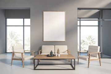 Gray living room interior with sofa and poster