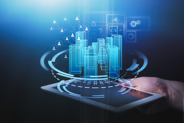 Man hand with HUD city interface