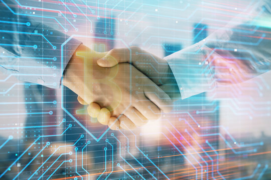 Double exposure of crypto economy theme drawing on cityscape background with handshake. Concept of partnership and blockchain