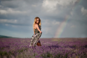 Woman walk on the lavender field.