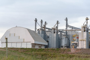 Fototapeta na wymiar Industrial plant of agricultural production of grains.jpg