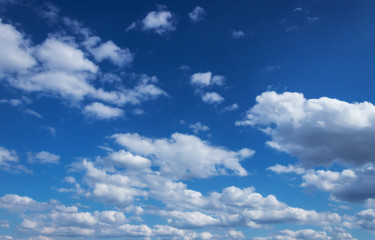 Naklejka na ściany i meble Blue sky with expressive clouds