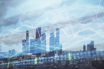 Double exposure of financial graph on downtown veiw background. Concept of stock market research and analysis