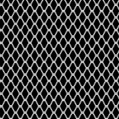 Textile texture of rough silvery color fabric with a blank space for abstract backgrounds and for wallpaper. The structure black and white lines, dots