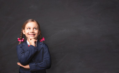 Back To School Concept, Portrait of Happy Smiling Child Student at Blackboard