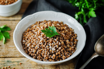 Buckwheat porridge with fresh parsley leaves