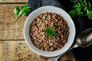 Buckwheat porridge with fresh parsley leaves