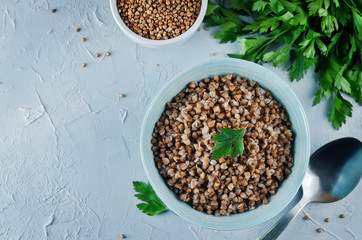 Buckwheat porridge with fresh parsley leaves