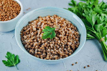 Buckwheat porridge with fresh parsley leaves