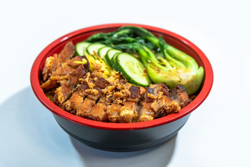 Crispy fried pork belly service with Chinese cabbage and fried rice