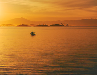 Fototapeta na wymiar Beautiful aerial image of fishing boats on sunset.