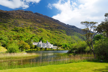 Fototapeta na wymiar Kylemore Abbey, a monastery founded on the grounds of Kylemore Castle, in Connemara. Famous tourist attraction in County Galway, Ireland.