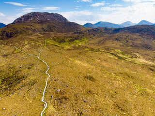 Beautiful view of Connemara National Park, famous for bogs and heaths, watched over by its...