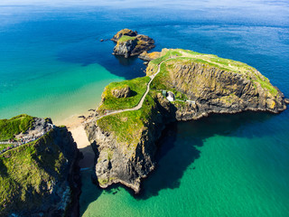 Carrick-a-Rede Rope Bridge, famous rope bridge near Ballintoy in County Antrim, linking the...