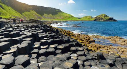 Giants Causeway, an area of hexagonal basalt stones, County Antrim, Northern Ireland. Famous tourist attraction, UNESCO World Heritage Site. - obrazy, fototapety, plakaty