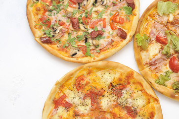 Delicious pizza on light background.