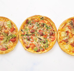 Delicious pizza on light background.