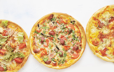Delicious pizza on light background.