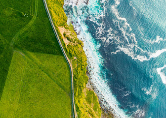 World famous Cliffs of Moher, one of the most popular tourist destinations in Ireland. Aerial view of known tourist attraction on Wild Atlantic Way in County Clare.