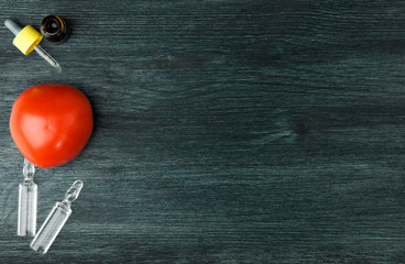 VEGETABLES ON BACKGROUND. SICK VEGETABLES ON A WOODEN SURFACE. COPY SPACE