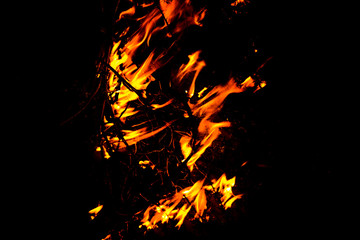 Fototapeta na wymiar bright fire on a black background