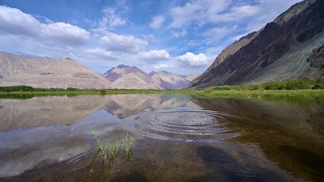 Time lapse of Lake reflects mountains in Diskit, Ladakh, India