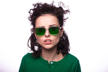 beautiful girl in green glasses and green sweater