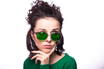 beautiful girl in green glasses and green sweater