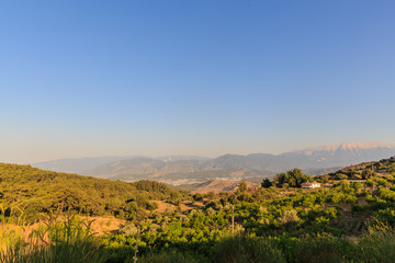 Fototapeta na wymiar Mountains and valley panorama in the morning near Kemer, Kumluca, Turkey