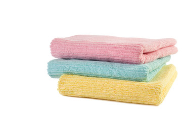 stack of three towels isolated on white background