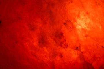 Fototapeta na wymiar Himalayan salt in orange light illuminated