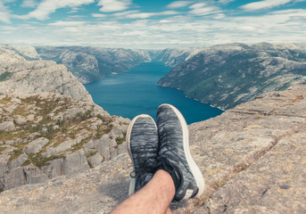 feet on top of the mountain