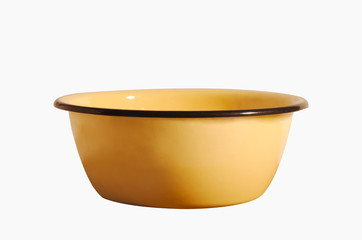 Enamel bowl yellow isolated on white background.