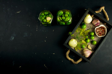 TEXTURE OF VEGETABLES IN A BOX ON A DARK BACKGROUND. CONCEPT OF PREPARING VEGETABLES FOR WINTER.